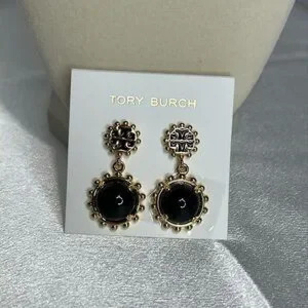 Tory Burch black and gold earrings price is firm